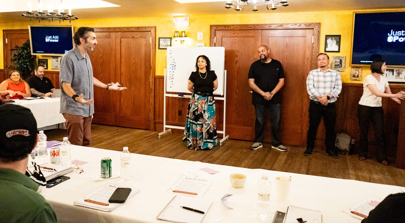 Workshop participants practicing ‘Yes, And’ in pairs
